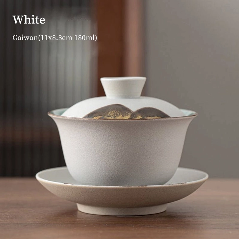 white matte ceramic gaiwan with landscape detailing
