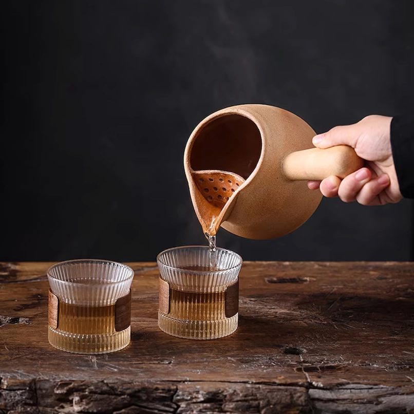 natural rustic texture of yellow ceramic kyusu teapot