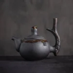 full view of 240ml zen branch black ceramic teapot with infuser